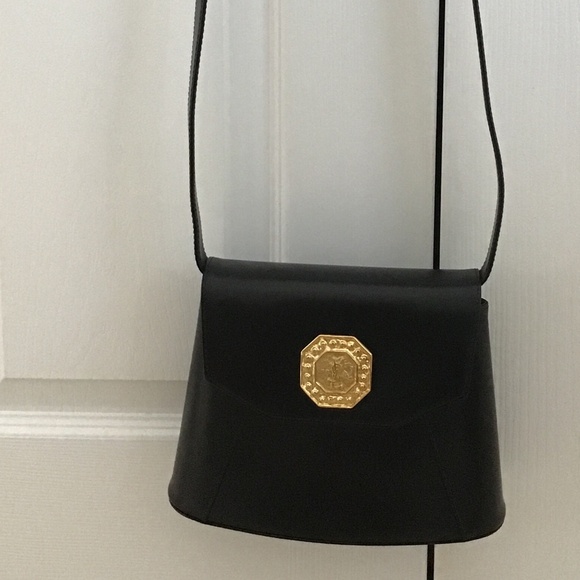 YSL Black Leather Handbag with YSL gold tone logo in the front - Picture 11 of 12